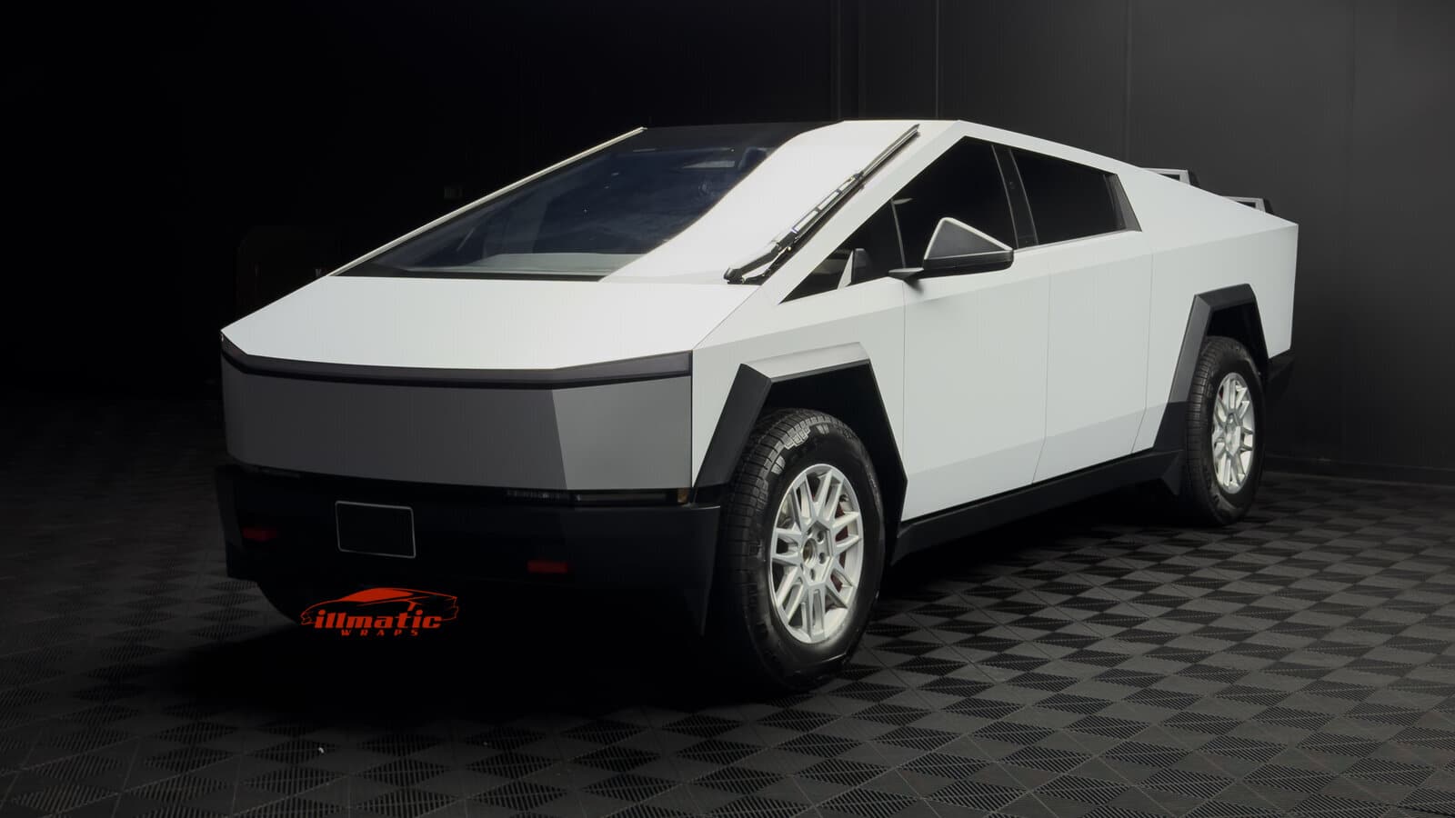 Front end of a Tesla Cybertruck wrapped in matte white at the Illmatic Wraps studio