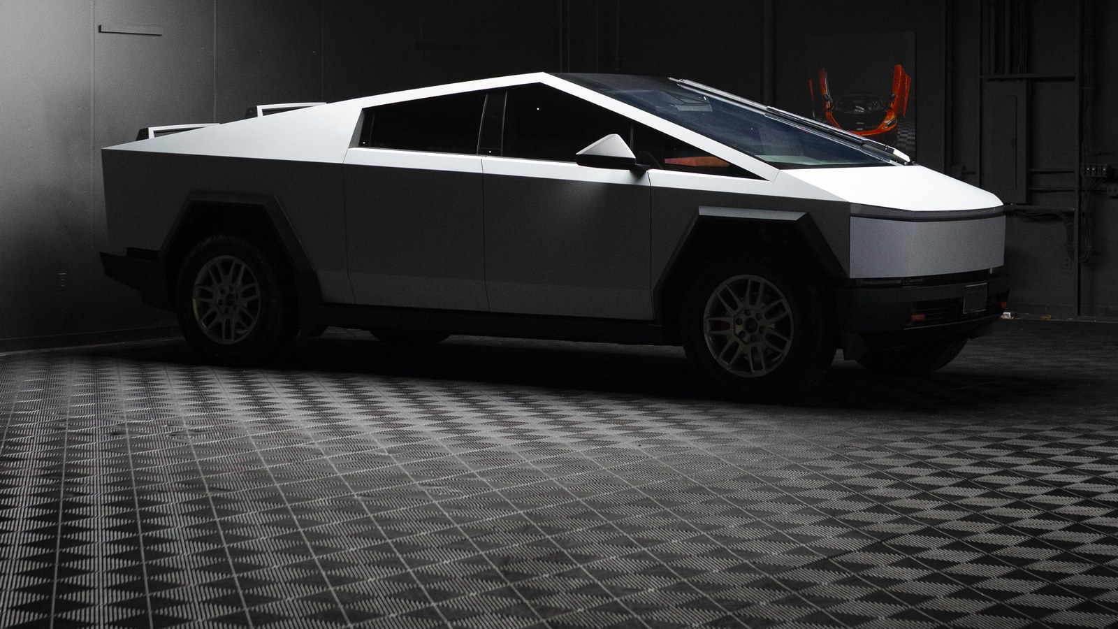 Tesla Cybertruck in a white color change wrap inside the illmatic Wraps studio in Hackensack, NJ